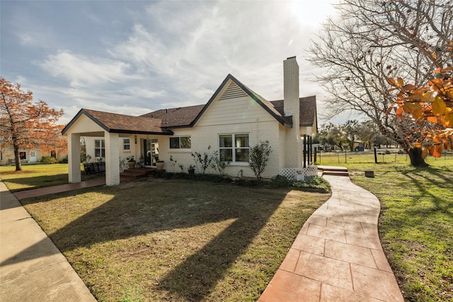 exterior space with a front yard