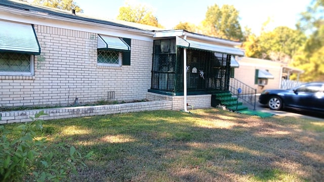 exterior space with a front lawn