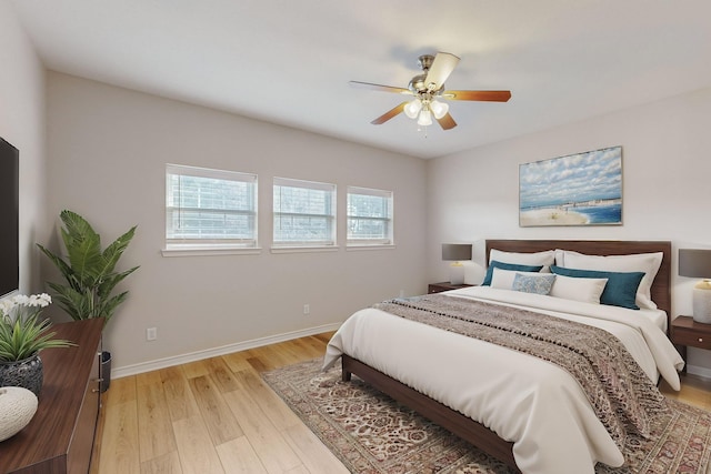 bedroom featuring ceiling fan and light wood-type flooring