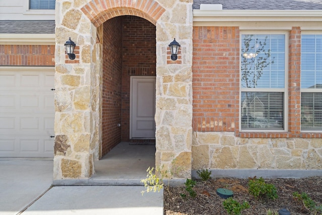 entrance to property with a garage