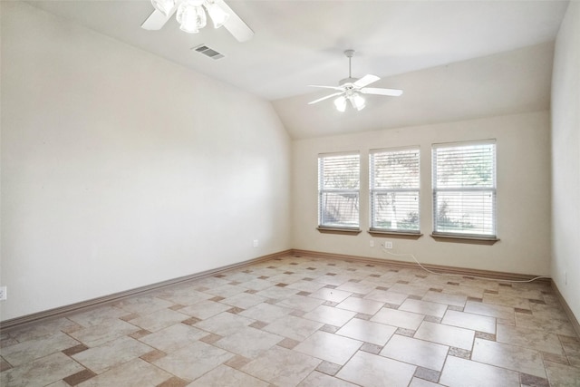 unfurnished room with ceiling fan and lofted ceiling