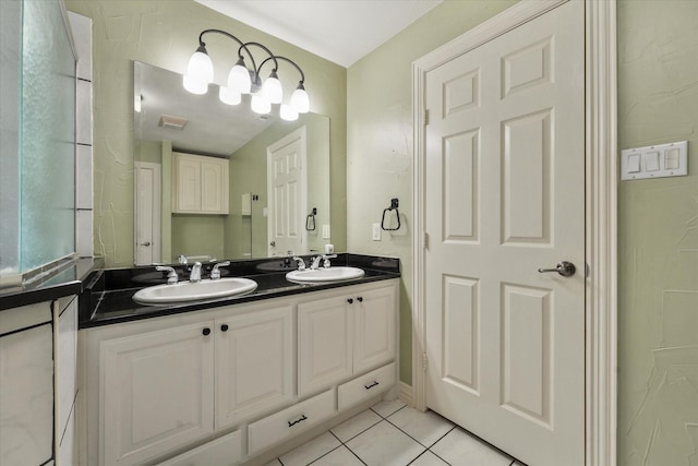 bathroom with vanity and tile patterned floors