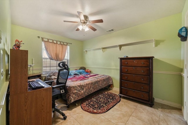 bedroom with light tile patterned flooring and ceiling fan