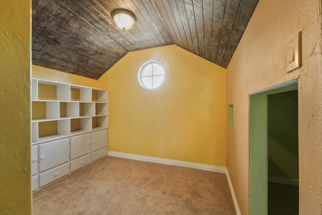 additional living space with carpet flooring, lofted ceiling, and wood ceiling