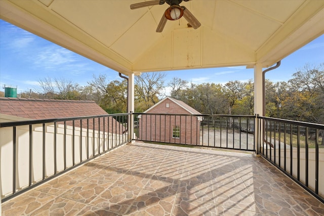 view of patio / terrace featuring a balcony and ceiling fan