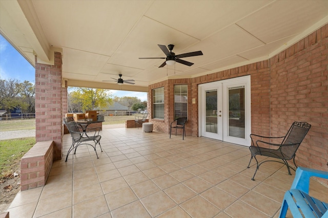 view of patio / terrace with ceiling fan and french doors