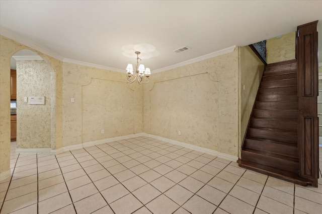 tiled empty room with ornamental molding and a notable chandelier