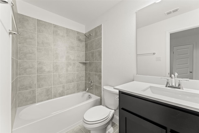 full bathroom with vanity, toilet, and tiled shower / bath combo