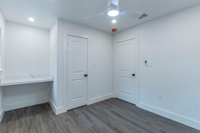 bedroom with wood-type flooring and ceiling fan