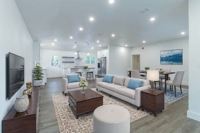 living room with wood-type flooring