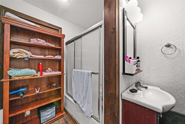 bathroom featuring vanity and hardwood / wood-style floors