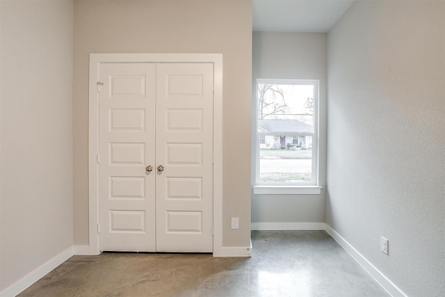 unfurnished bedroom featuring a closet