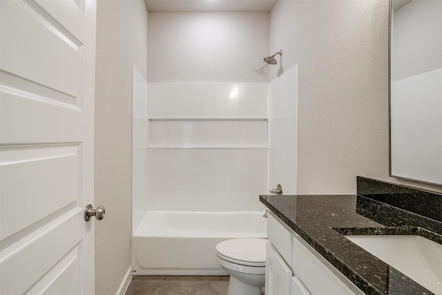 full bathroom featuring washtub / shower combination, vanity, and toilet