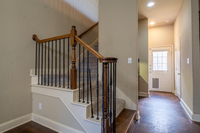 stairway with wood-type flooring