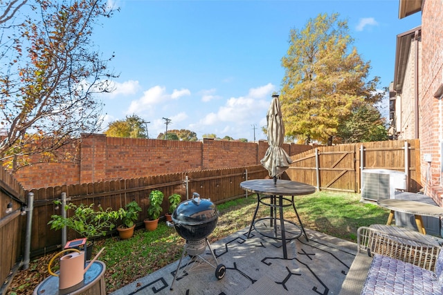 view of patio / terrace featuring cooling unit