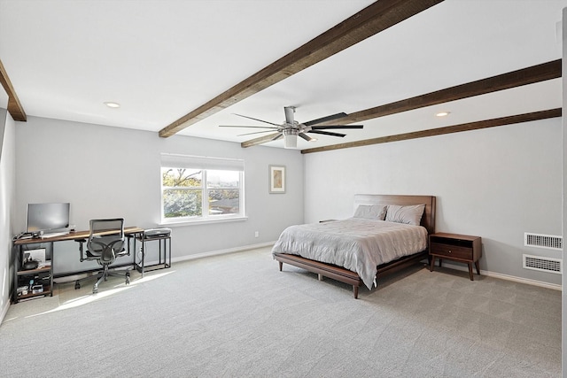 bedroom featuring ceiling fan, light colored carpet, and beamed ceiling