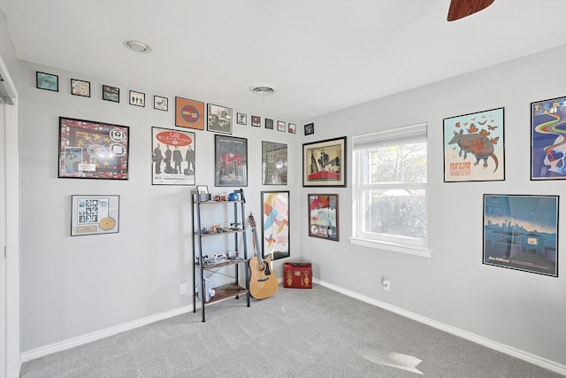 bedroom with ceiling fan and carpet floors