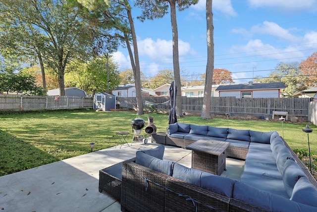 view of patio featuring a storage shed and outdoor lounge area