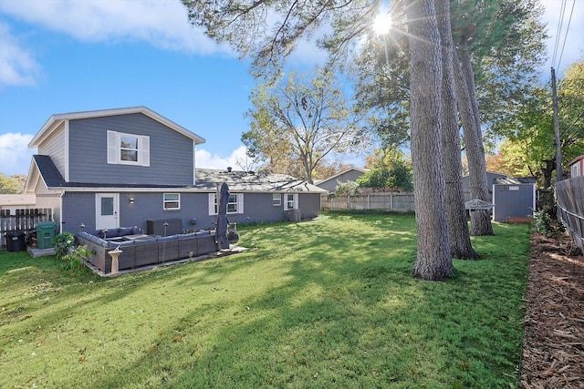 view of yard featuring a storage shed and outdoor lounge area