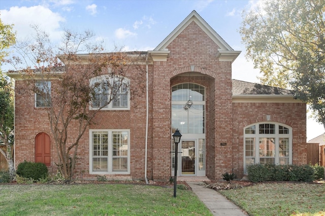 view of front of house with a front lawn