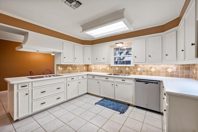 kitchen with sink, white cabinetry, stainless steel dishwasher, kitchen peninsula, and black electric stovetop