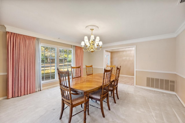 dining space featuring crown molding, light colored carpet, a chandelier, baseboards, and visible vents