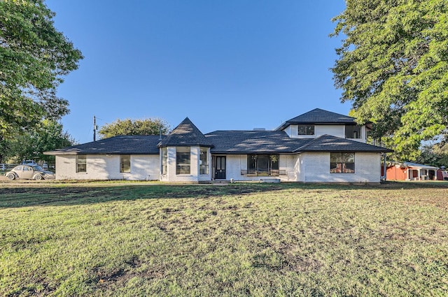 view of front of home with a front lawn