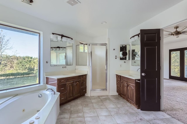 bathroom featuring vanity, plenty of natural light, and ceiling fan