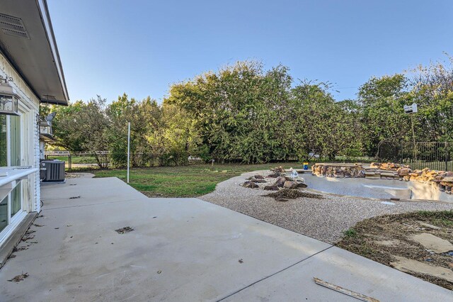 view of patio featuring central AC unit