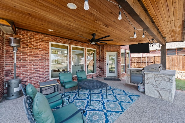 view of patio / terrace featuring area for grilling and ceiling fan