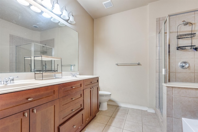 341 Metropolitan Dr, Plano, TX 75023 - bathroom featuring double vanity, a stall shower, tile patterned floors, and a bath