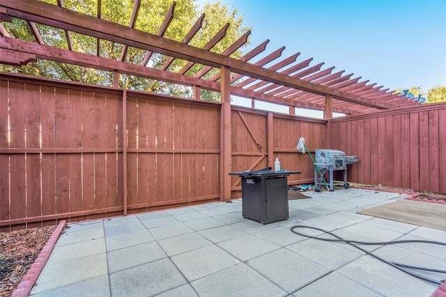 341 Metropolitan Dr, Plano, TX 75023 - fenced backyard with a patio area, a pergola, and area for grilling
