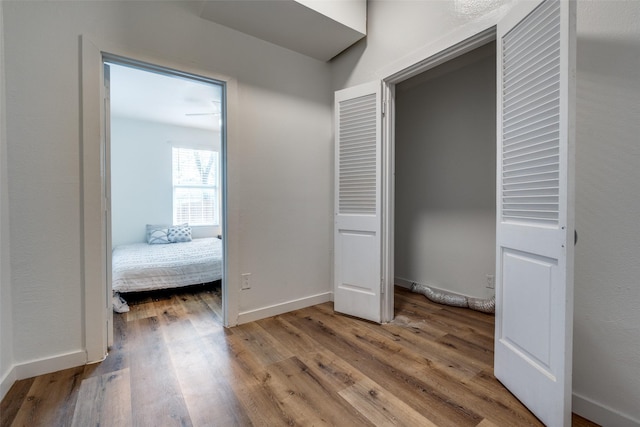 unfurnished bedroom featuring wood-type flooring