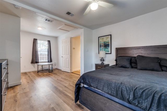 bedroom with light wood-type flooring and ceiling fan