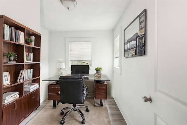 home office with light wood-type flooring