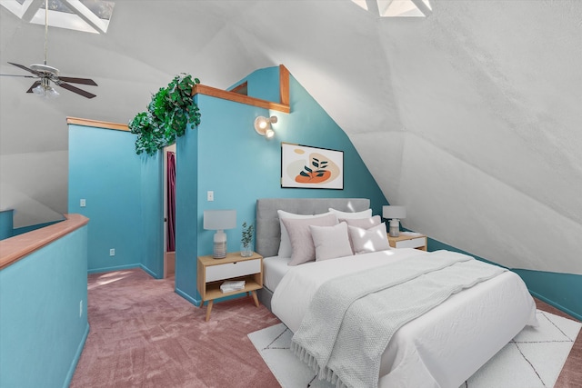 carpeted bedroom with ceiling fan and vaulted ceiling