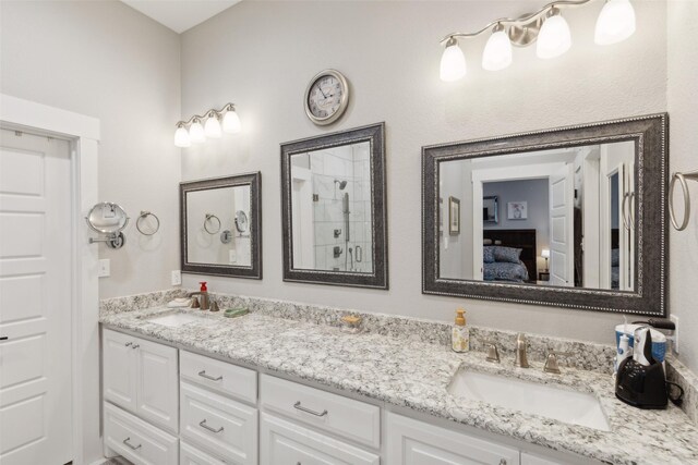 bathroom with vanity and walk in shower