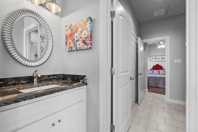 bathroom with vanity, tile patterned floors, and ceiling fan