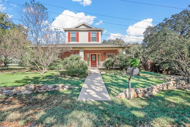 view of front property featuring a porch and a front lawn