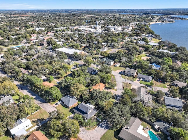 birds eye view of property featuring a residential view and a water view