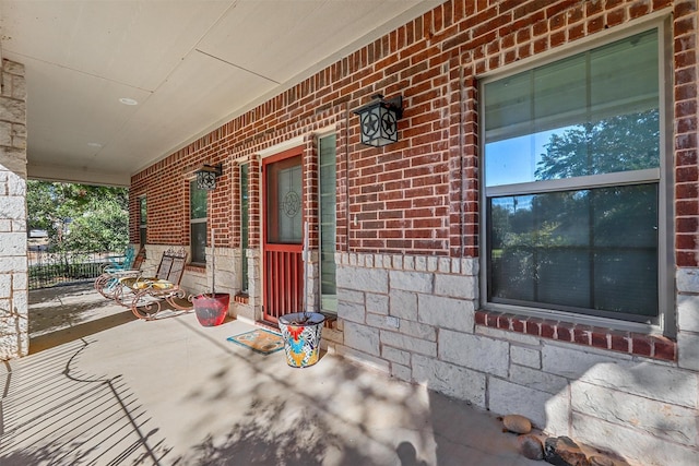 view of patio featuring a porch