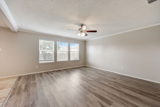 spare room with hardwood / wood-style flooring, ceiling fan, crown molding, and a textured ceiling