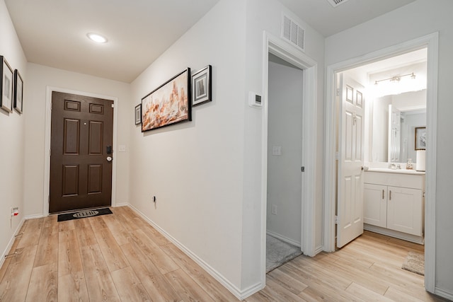 hall featuring light hardwood / wood-style floors