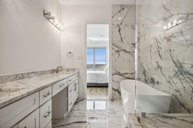 bathroom featuring vanity and a bathing tub