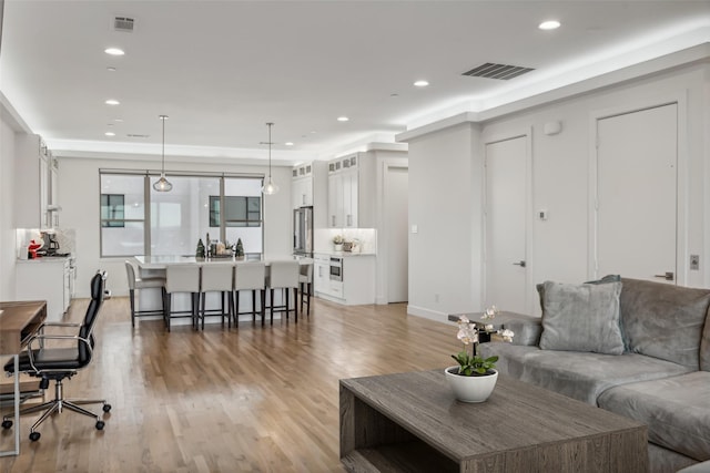 living room featuring light hardwood / wood-style floors