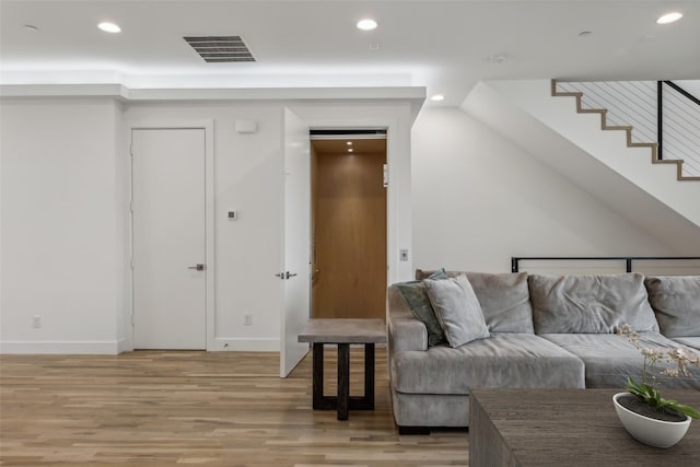 living room with wood-type flooring