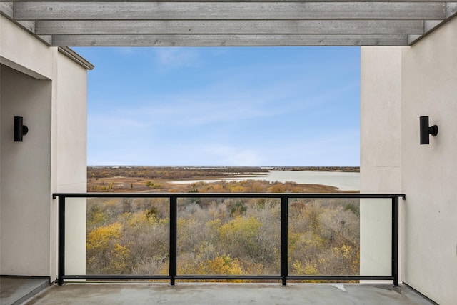 balcony featuring a water view