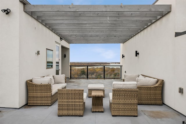 view of patio / terrace with a pergola and outdoor lounge area