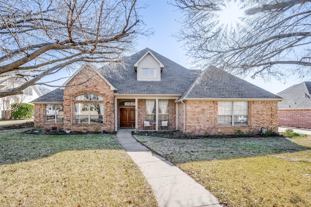 view of front of property with a front lawn