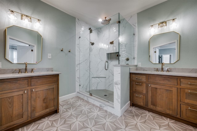 bathroom with tile patterned floors, vanity, and an enclosed shower